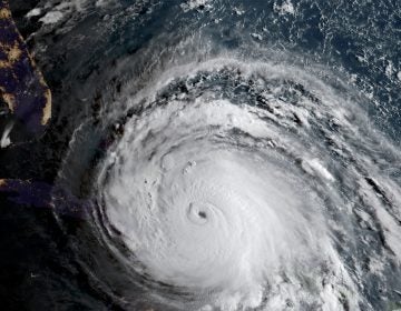  In this geocolor image GOES-16 satellite image taken Friday, Sept. 8, 2017, at 11:45 UTC, sunlight, from the right, illuminates Hurricane Irma as the storm approaches Cuba and Florida. (NOAA via AP) 