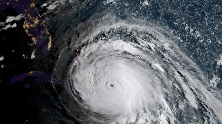  In this geocolor image GOES-16 satellite image taken Friday, Sept. 8, 2017, at 11:45 UTC, sunlight, from the right, illuminates Hurricane Irma as the storm approaches Cuba and Florida. (NOAA via AP) 