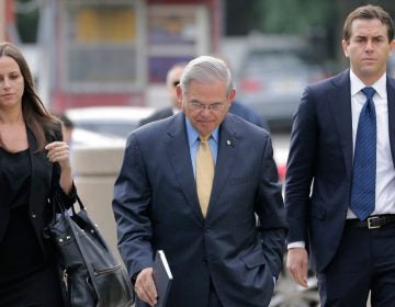  Sen. Bob Menendez, center, arrives with his children, Alicia Menendez and Robert Menendez Jr., to court for his federal corruption trial in Newark, N.J., Wednesday, Sept. 6, 2017. (AP Photo/Seth Wenig) 