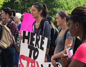 Dozens of University of Delaware students rally to show their support for those in danger of losing their DACA protections. (Nichelle Polston/WHYY)