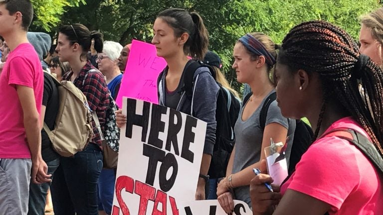 Dozens of University of Delaware students rally to show their support for those in danger of losing their DACA protections. (Nichelle Polston/WHYY)