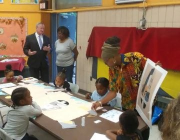 Mayor Kenney observes children at a learning center at Mander Recreation Center