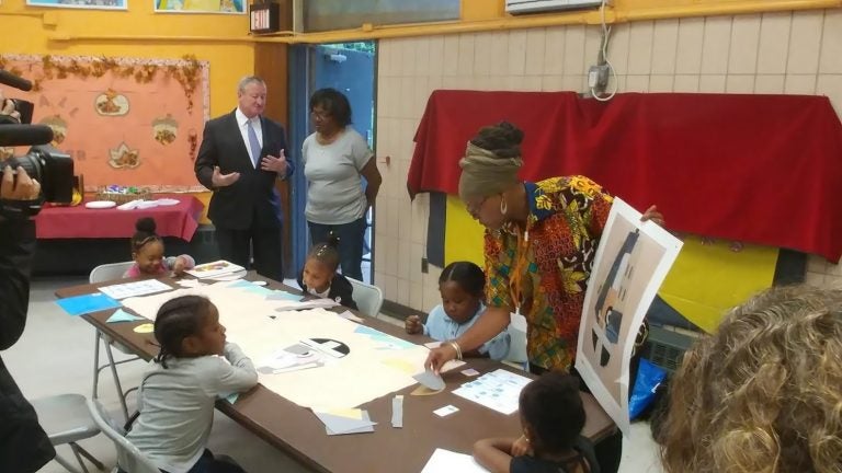 Mayor Kenney observes children at a learning center at Mander Recreation Center