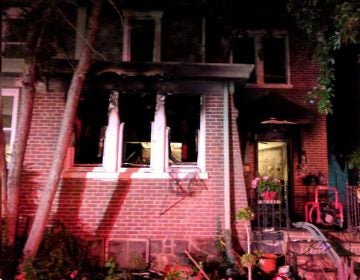  One man was killed and two others were injured in this house fire on W. 37th St. in Wilmington. (photo courtesy Wilmington Fire Marshal's Office) 