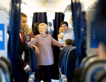  Democratic presidential candidate Hillary Clinton is shown speaking to aides on her campaign plane, in White Plains, N.Y., Thursday, Sept. 15, 2016. (AP Photo/Andrew Harnik, file) 