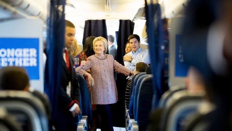  Democratic presidential candidate Hillary Clinton is shown speaking to aides on her campaign plane, in White Plains, N.Y., Thursday, Sept. 15, 2016. (AP Photo/Andrew Harnik, file) 