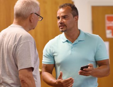  Mentor Frantz Herr (left) and returning citizen Isaac Rivera (right) have a discussion before the Lancaster County re-entry program at the Ebenezer Baptist Church Wednesday, Aug. 2, 2017, in Lancaster, Pennsylvania. (Bradley C. Bower/Philadelphia Inquirer) 