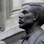 Close up of the sculpture; the face of Octavius Catto seen from the side, looking left