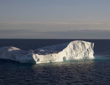 An iceberg floats in Baffin Bay in the Canadian Arctic Archipelago, Tuesday, July 25, 2017. The iceberg calved off a glacier from the Greenland ice sheet, the second largest body of ice in the world which covers roughly 80 percent of the country. (David Goldman/AP Photo)