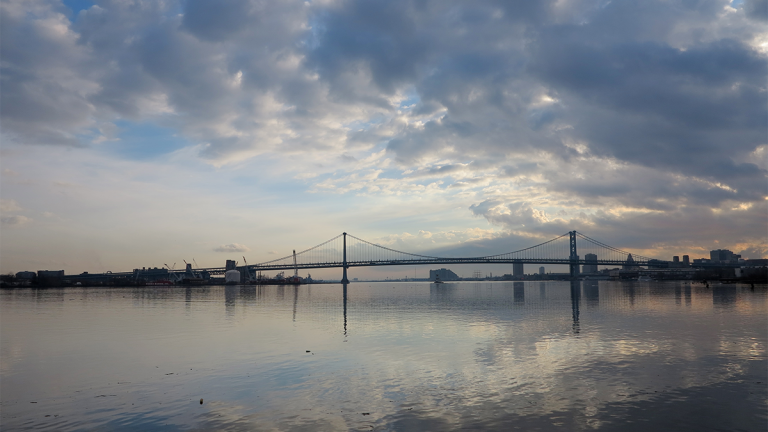 A view of the Ben Franklin Bridge and Delaware River (Ashley Hahn/PlanPhilly, file)  