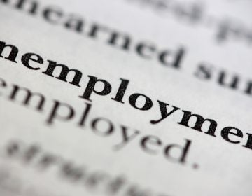 Close up of a dictionary word Unemployment (photo/bigstock)</a> 