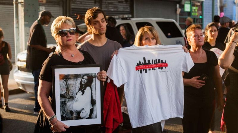 Donna Morgan, (left), stands with a picture of her daughter Brittany who died of a heroin overdose in May 2017 along with her son Nathan and friend Robin D'Angleo whose son is in recovery for heroin addiction. (Brad Larrison for NewsWorks)