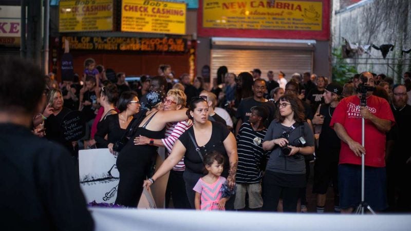 Hundreds march up Kensington Avenue Thursday for the March in Black in remembrance of those who have died from opioid overdoses. (Brad Larrison for NewsWorks)