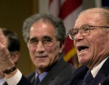 Robert McNamara, right, defense secretary under Presidents Kennedy and Johnson, is shown in 2001 at a forum at the John F. Kennedy School of Government at Harvard University in Cambridge, Mass. (AP Photo/Steven Senne, File)