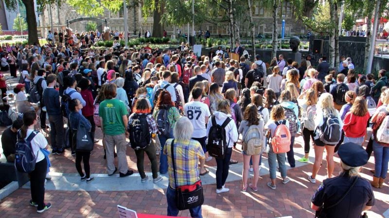 Hundreds of people gather at Founder's Garden at Temple University to remember slain student Jenna Burleigh.