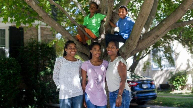 Jameria Miller, (left), pictured with her mother Jamella, sister Kene, brother Bryant and cousin Braylon at their Landsdowne home. The Millers are featured in an upcoming documentary on the National Geographic Channel. (Brad Larrison for NewsWorks)