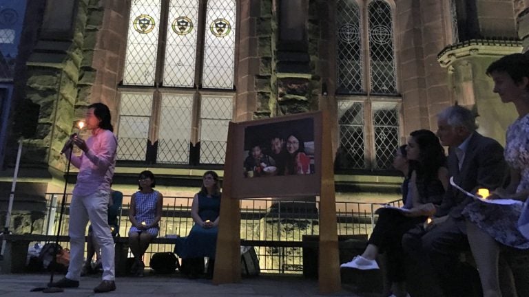  Zhan Zhang, a friend of Xiyue Wang, speaks during a vigil calling for his release (Jeanette Beebe for WHYY) 