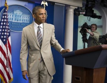  In this Thursday, Aug. 28, 2014 file photo, President Barack Obama leaves after speaking about the economy, Iraq, and Ukraine, in the James Brady Press Briefing Room of the White House in Washington, before convening a meeting with his national security team on the militant threat in Syria and Iraq. Obama's summer fashion choice, not unprecedented among presidents - himself included - was the talk of social media, Thursday. Other presidents who have taken on tan include Bill Clinton, Ronald Reagan, George H. W. Bush, George W. Bush and Dwight Eisenhower. (AP Photo/Evan Vucci, file) 