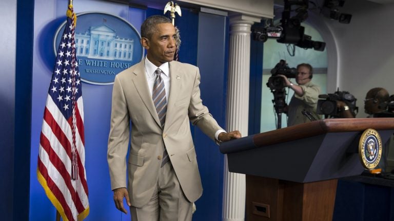  In this Thursday, Aug. 28, 2014 file photo, President Barack Obama leaves after speaking about the economy, Iraq, and Ukraine, in the James Brady Press Briefing Room of the White House in Washington, before convening a meeting with his national security team on the militant threat in Syria and Iraq. Obama's summer fashion choice, not unprecedented among presidents - himself included - was the talk of social media, Thursday. Other presidents who have taken on tan include Bill Clinton, Ronald Reagan, George H. W. Bush, George W. Bush and Dwight Eisenhower. (AP Photo/Evan Vucci, file) 