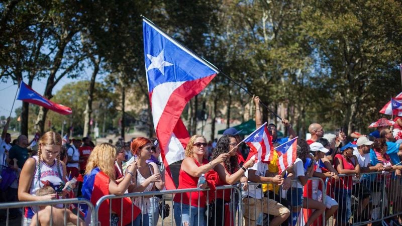 The 2017 Puerto Rican Day Parade on the Benjamin Franklin Parkway celebrates the island's culture and calles for charity to aid in its recovery following the damage caused by Hurricane Maria. (