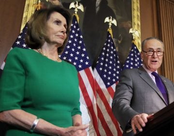 Senate Minority Leader Chuck Schumer of N.Y., right, with House Minority Leader Nancy Pelosi of Calif. and Rep. Hakeem Jeffries, D-N.Y., back left, speaks to reporters on Capitol Hi