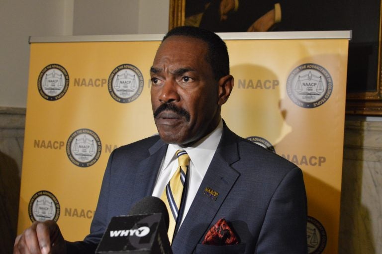 Philadelphia head of the NAACP Rodney Muhammad speaks at City Hall. (Tom MacDonald/WHYY) 