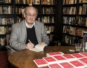 Author Salman Rushdie poses for photographers at a signing for his new book 'Home',  in London, Tuesday, June 6, 2017. (Photo by Grant Pollard/Invision/AP)