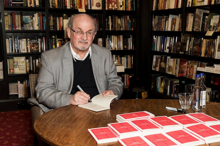 Author Salman Rushdie poses for photographers at a signing for his new book 'Home',  in London, Tuesday, June 6, 2017. (Photo by Grant Pollard/Invision/AP)