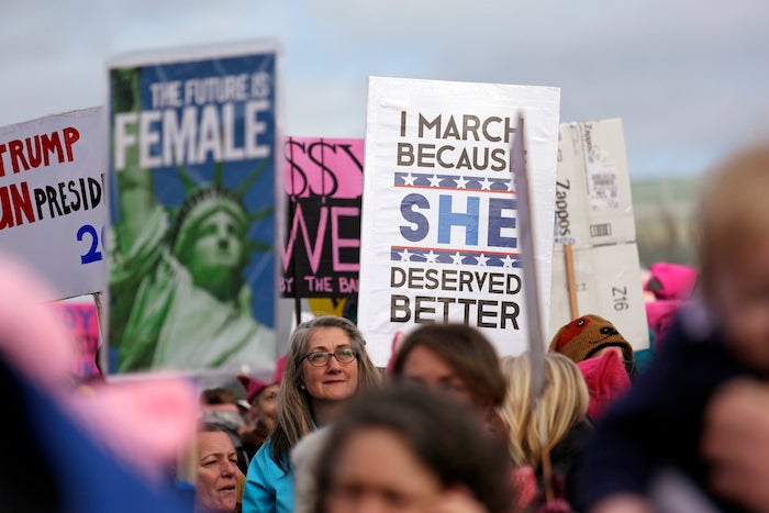 Protesters crowd a park to overflowing for a rally before a women's march Saturday, Jan. 21, 2017, in Seattle. Women across the Pacific Northwest marched in solidarity with the Women's March on Washington and to send a message in support of women's rights and other causes. (AP Photo/Elaine Thompson)