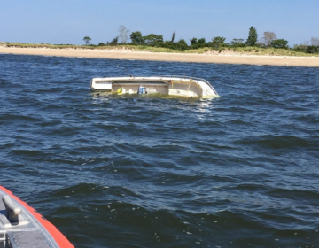  A capsized boat off Sandy Hook in Monmouth County Monday afternoon. (USCG image) 