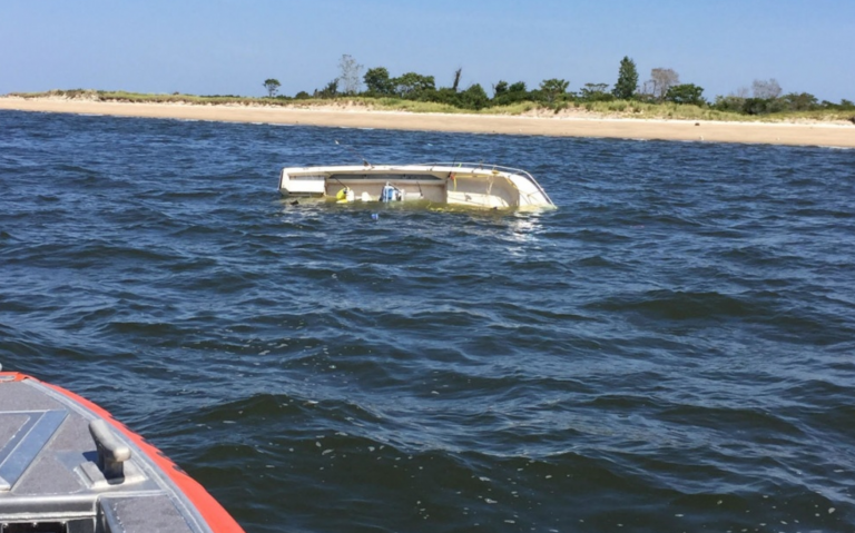  A capsized boat off Sandy Hook in Monmouth County Monday afternoon. (USCG image) 