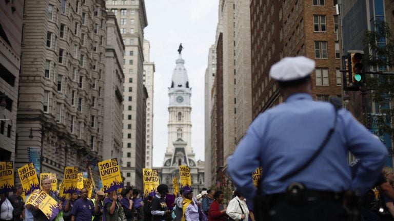  Members of Service Employees International Union march near City Hall in Philadelphia. (AP File Photo/Matt Rourke) 