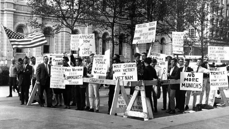 Wooden barricades block Young Americans for Freedom picketers off from Students Against Vietnam Policies on Oct. 15, 1965. (Courtesy of George D. McDowell Philadelphia Evening Bulletin Collection, Temple University Libraries)