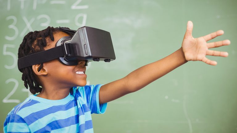 (<a href='https://www.bigstockphoto.com/image-137254502/stock-photo-school-boy-in-virtual-reality-glasses-in-classroom-at-school'>Wavebreak Media Ltd</a>/Big Stock Photo)