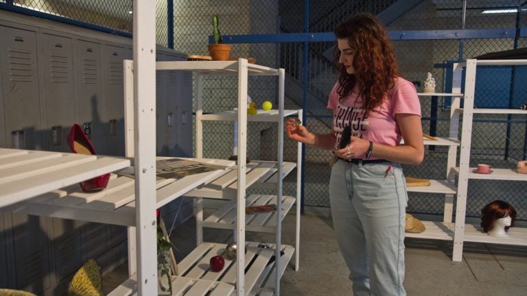  'Worktable' participants are invited to chose an object to take apart and reassemble before entering the rest of the exhibit. (Kimberly Paynter/WHYY) 