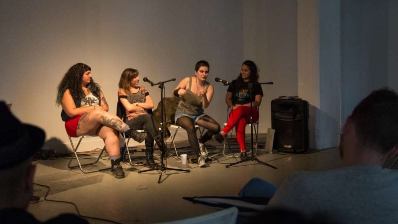 Sofia Ben-Hur (second from right), of the punk band Flwer Pnk, animatedly talks about their experience with idenity and religion as a MENA artist. (Emily Cohen for WHYY)