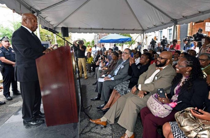 U.S. Rep. John Lewis addresses the crowd at the September 2016 press conference to announce the preservation of the Martin Luther King, Jr. house at 753 Walnut Street in Camden.  (April Saul/for WHYY)