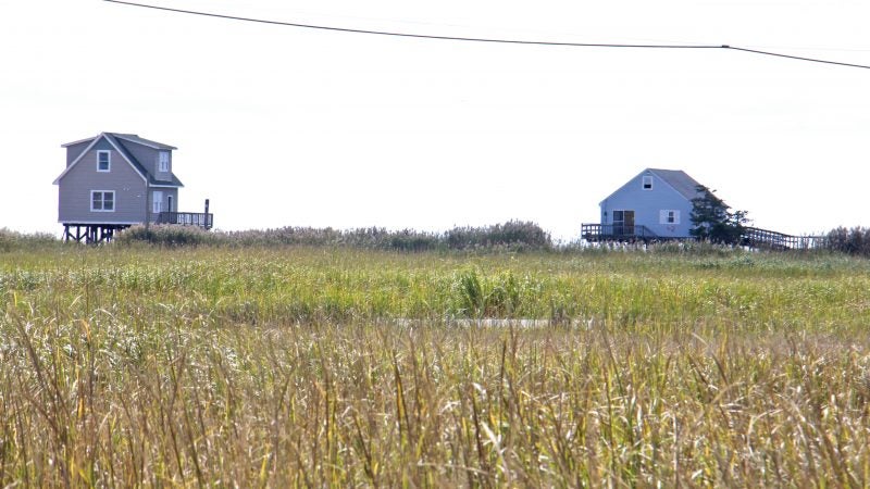 Bayside homes to be demolished at Bay Point are marked with numbers painted in red.