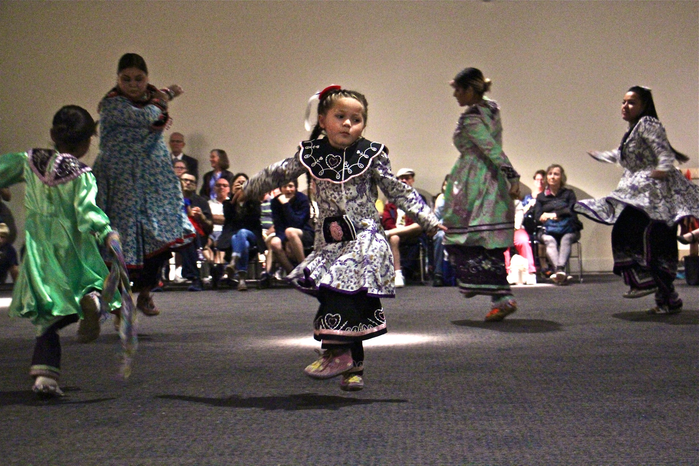 Reina Alice, 5, of the Oneida Nation performs with the Longhouse Singers and Dancers at the Museum of the American Revolution.