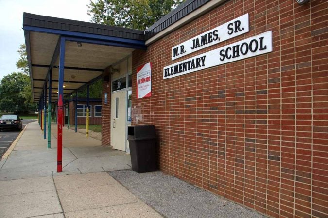 The Pennypacker Park Elementary School was renamed in 2001 for the Rev. W. R. James, whose discrimination lawsuit against Levitt and Sons opened the door to African American homeowners in Willingboro. (Emma Lee/WHYY)