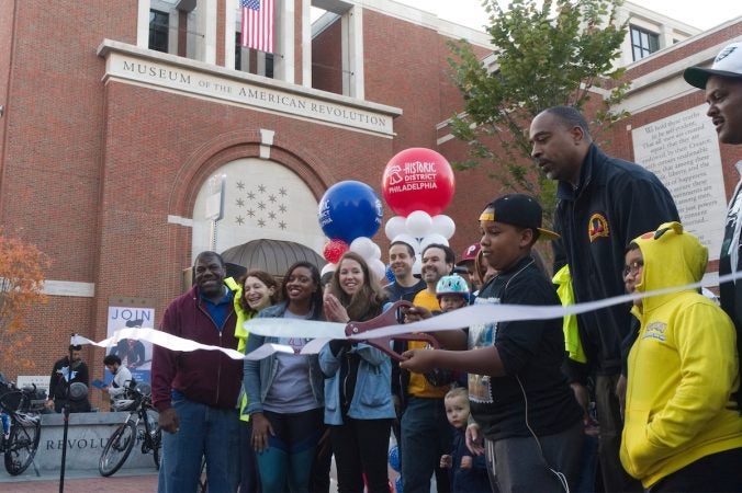 The ribbon is cut for the second annual Philly Free Streets event,Saturday, Oct. 28, 2017. (Bastiaan Slabbers for WHYY)