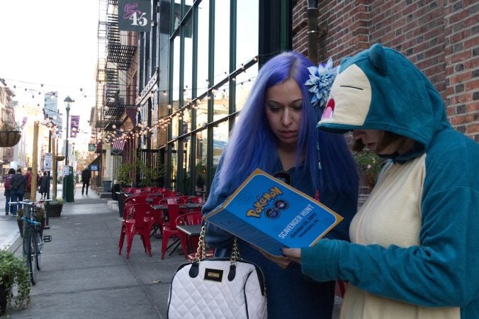 Stephanie Clark end Cassy Golden traveled from Baltimore to attend the Pokémon Scavenger Hunt during Philly Free Streets on North Third Street, Saturday, Oct. 28, 2017. (Bastiaan Slabbers for WHYY)