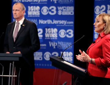 Republican nominee Lt. Gov. Kim Guadagno, right, answers a question during a gubernatorial debate against Democratic nominee Phil Murphy at William Paterson University in Wayne, N.J.  (AP Photo/Julio Cortez, pool)