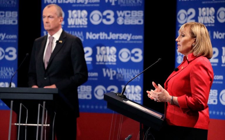 Republican nominee Lt. Gov. Kim Guadagno, right, answers a question during a gubernatorial debate against Democratic nominee Phil Murphy at William Paterson University in Wayne, N.J.  (AP Photo/Julio Cortez, pool)