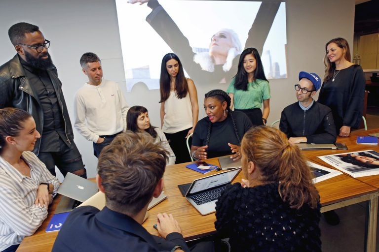 A group of people, generally young, diverse in races