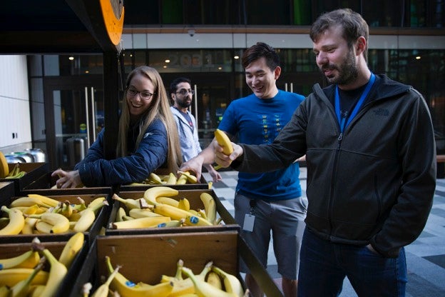 A man at a banana stand