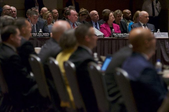 People listen as Sessions speaks