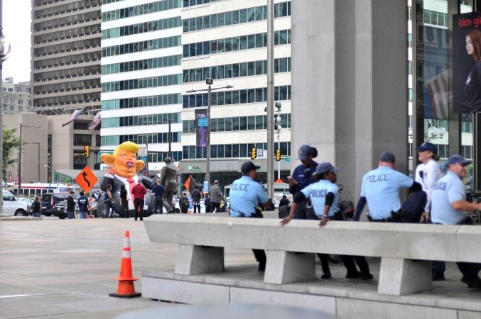 While the attorney general was speaking nearby, a pop-up inflatable 