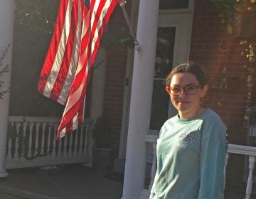 Erin Dunphy, 16, has raised almost $2,500 to distribute signs to her neighbors. (Annette John-Hall/WHYY)