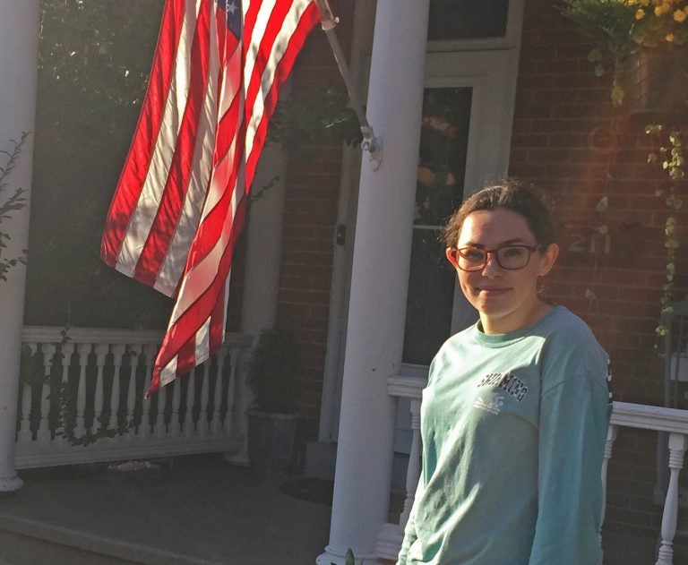 Erin Dunphy, 16, has raised almost $2,500 to distribute signs to her neighbors. (Annette John-Hall/WHYY)